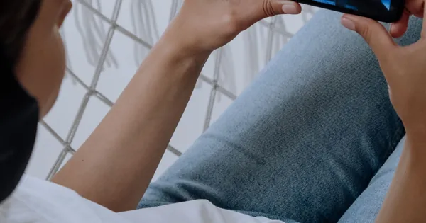 Person watching a video on a smartphone