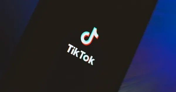Growing TikTok followers on a phone